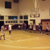 Jine Han gets ready to shoot the free throw as Eddie instructs the team