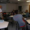 Karakoa (check shirt) on earlier course.