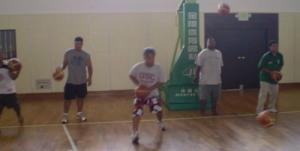 Coaches practicing the dribbling technique