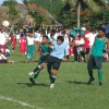 Iakina player holds back Lupelele opponent