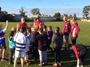 MJFNC Players helping the younger Auskickers